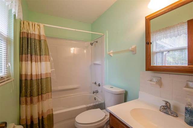full bath with a wealth of natural light, shower / tub combo, toilet, and decorative backsplash