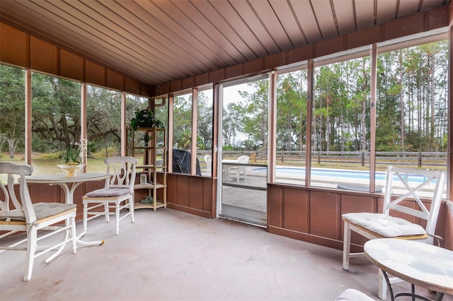 sunroom / solarium featuring plenty of natural light