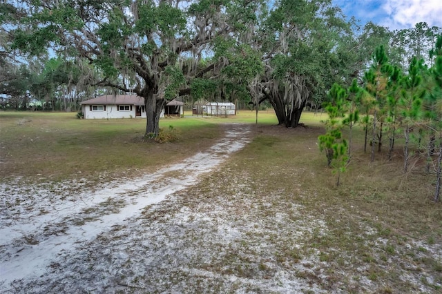 view of street with driveway