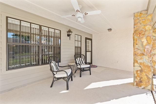 view of patio / terrace with a porch and a ceiling fan
