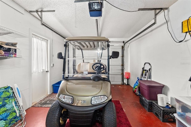 garage featuring a garage door opener and concrete block wall