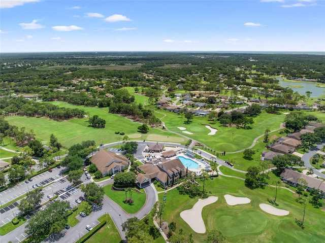 bird's eye view with golf course view and a water view