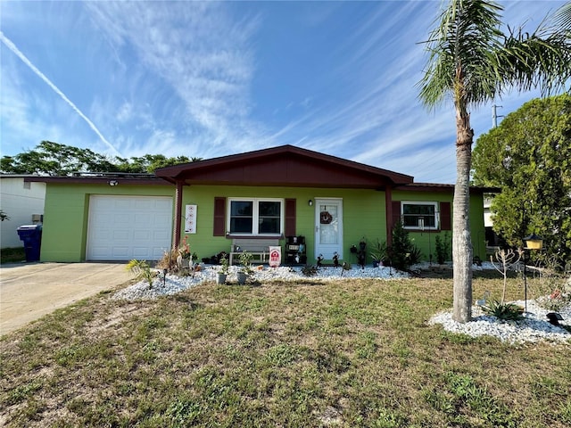 8053 Hixton Dr, Port Richey, FL 34668 - single story home featuring an attached garage, concrete block siding, driveway, and a front yard