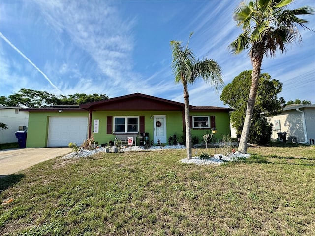 8053 Hixton Dr, Port Richey, FL 34668 - ranch-style house featuring a garage, driveway, and a front yard