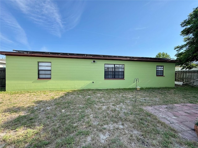 8053 Hixton Dr, Port Richey, FL 34668 - back of house featuring concrete block siding