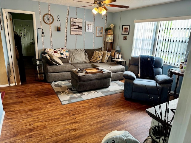 8053 Hixton Dr, Port Richey, FL 34668 - living room featuring wood finished floors and a ceiling fan