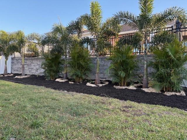 1436 Gopher Loop, Tarpon Springs, FL 34689 - view of yard with fence