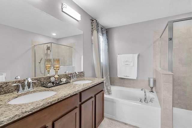 11895 Crestridge Loop, New Port Richey, FL 34655 - bathroom with double vanity, a sink, a stall shower, and a garden tub