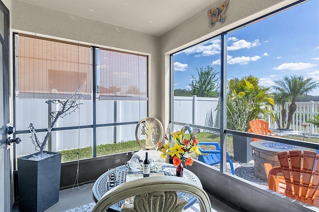 11895 Crestridge Loop, New Port Richey, FL 34655 - sunroom / solarium with a textured wall