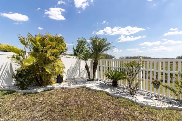 11895 Crestridge Loop, New Port Richey, FL 34655 - view of yard featuring a fenced backyard