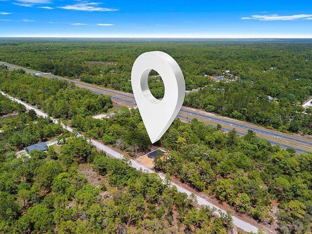 18082 Parakeet Rd, Brooksville, FL 34614 - exterior view of a view of trees