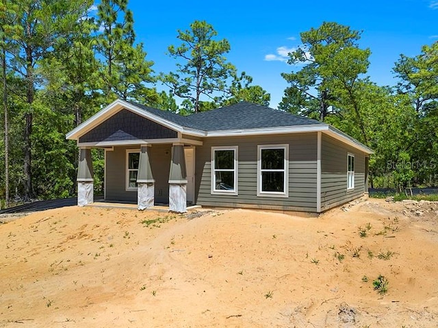 18082 Parakeet Rd, Brooksville, FL 34614 - view of front of home featuring covered porch