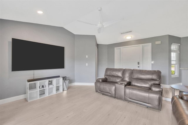 8626 White Springs Dr, New Port Richey, FL 34655 - living area featuring lofted ceiling, ceiling fan, visible vents, and wood finished floors