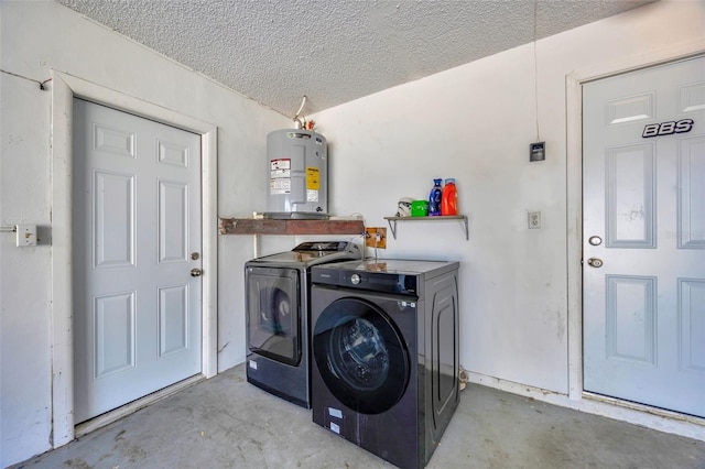 8626 White Springs Dr, New Port Richey, FL 34655 - laundry area with water heater, washing machine and clothes dryer, laundry area, and a textured ceiling