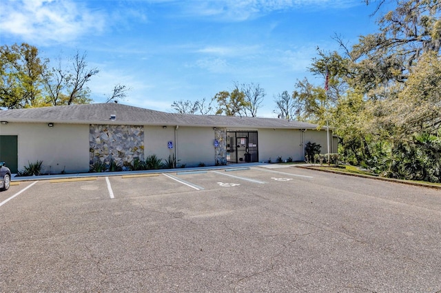 8626 White Springs Dr, New Port Richey, FL 34655 - view of building exterior featuring uncovered parking