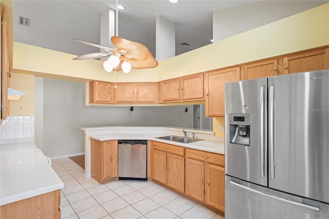 303 Rochester St, Spring Hill, FL 34609 - kitchen with visible vents, light countertops, light tile patterned floors, appliances with stainless steel finishes, and a sink