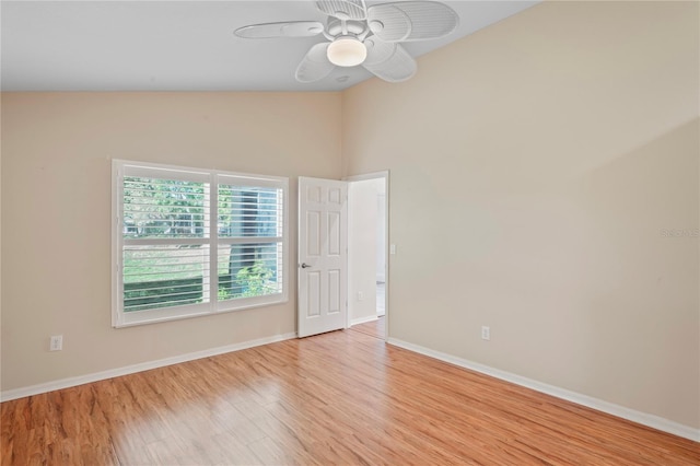 303 Rochester St, Spring Hill, FL 34609 - unfurnished room featuring vaulted ceiling, wood finished floors, baseboards, and ceiling fan
