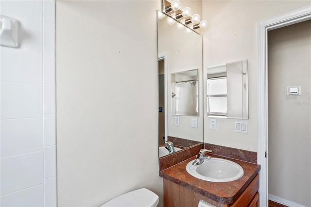 303 Rochester St, Spring Hill, FL 34609 - bathroom featuring toilet and vanity