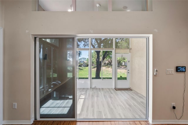303 Rochester St, Spring Hill, FL 34609 - entryway featuring wood finished floors