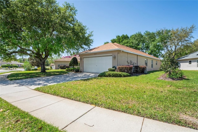303 Rochester St, Spring Hill, FL 34609 - ranch-style house featuring stucco siding, driveway, an attached garage, and a front lawn