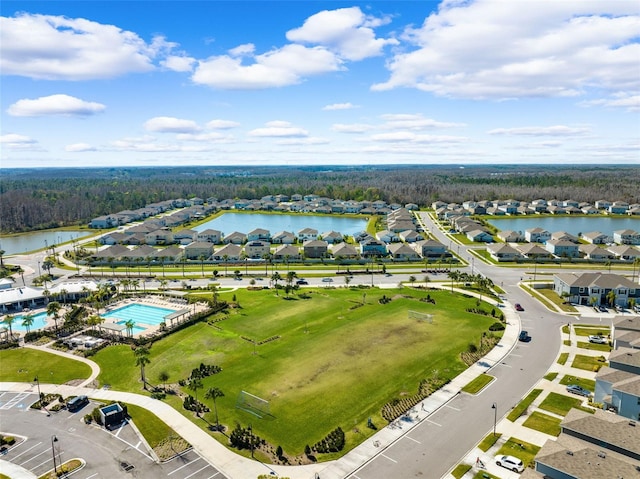 aerial view with a water view and a residential view