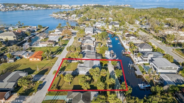birds eye view of property featuring a residential view and a water view
