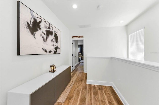 10623 Marsha Dr, New Port Richey, FL 34655 - hallway with light wood finished floors, recessed lighting, and baseboards