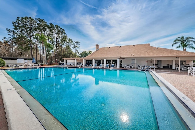 pool with a patio
