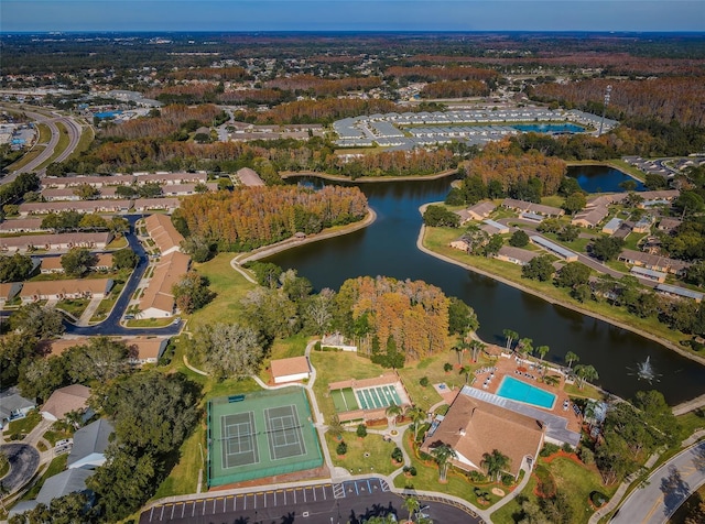 drone / aerial view with a water view