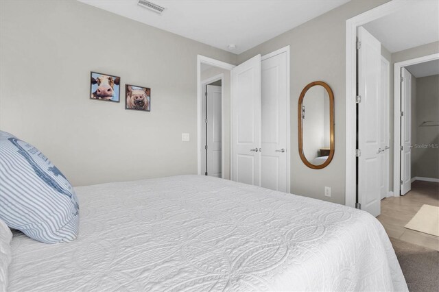bedroom with visible vents