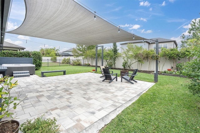 view of patio with a hot tub, central AC unit, and a fenced backyard
