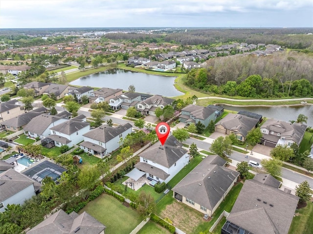 aerial view with a water view and a residential view