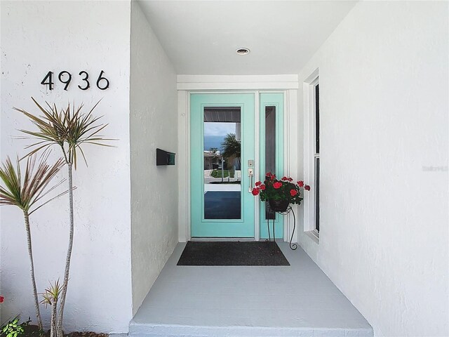 4936 Dory Dr, New Port Richey, FL 34652 - property entrance with stucco siding