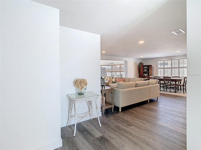 4936 Dory Dr, New Port Richey, FL 34652 - living area featuring visible vents, wood finished floors, and recessed lighting