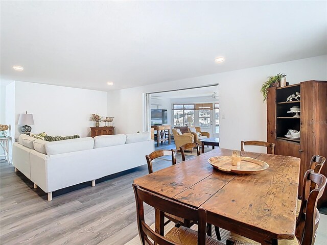 4936 Dory Dr, New Port Richey, FL 34652 - dining room with recessed lighting and light wood-style floors