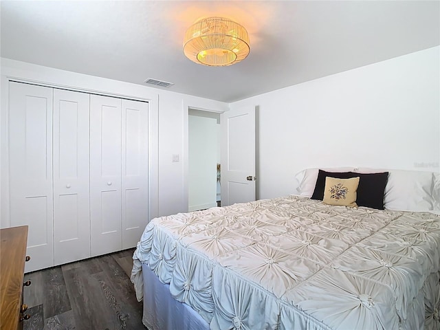 4936 Dory Dr, New Port Richey, FL 34652 - bedroom featuring visible vents, a closet, and wood finished floors