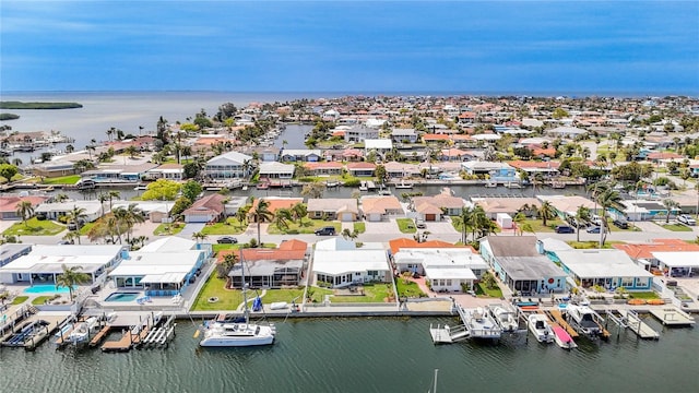 4936 Dory Dr, New Port Richey, FL 34652 - drone / aerial view featuring a residential view and a water view