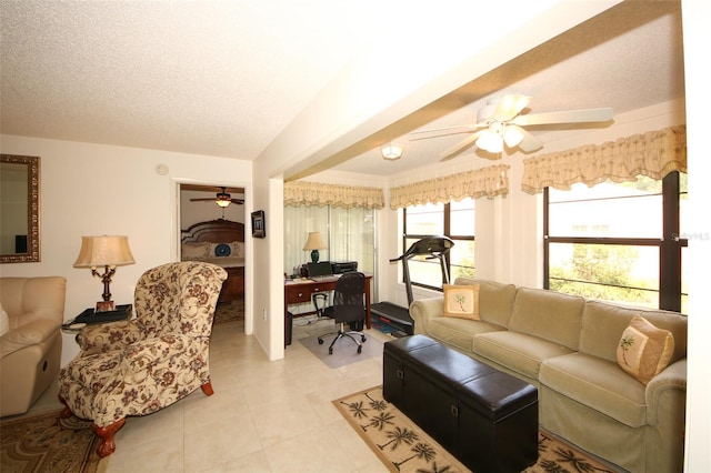 9321 Whitstone Ct, New Port Richey, FL 34655 - living area featuring a textured ceiling, light tile patterned floors, and a ceiling fan