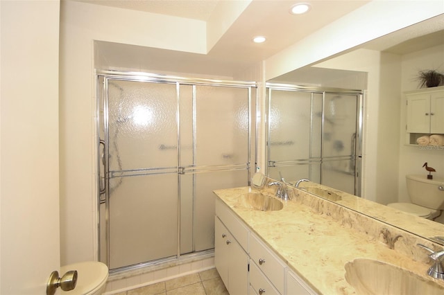 9321 Whitstone Ct, New Port Richey, FL 34655 - bathroom featuring a shower stall, toilet, and a sink