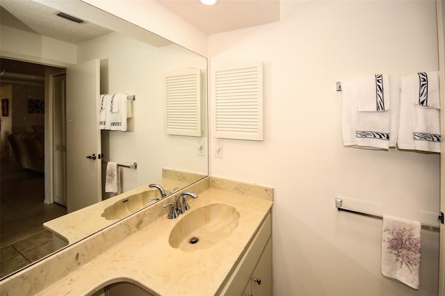 9321 Whitstone Ct, New Port Richey, FL 34655 - bathroom with visible vents and vanity