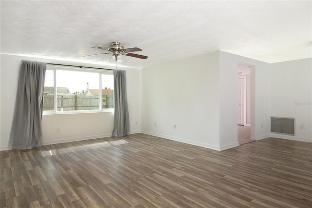 2620 Baltic Pl, Holiday, FL 34691 - spare room with ceiling fan, baseboards, wood finished floors, and visible vents