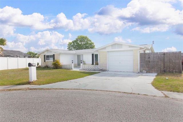 2620 Baltic Pl, Holiday, FL 34691 - ranch-style home featuring fence, a front lawn, an attached garage, driveway, and brick siding