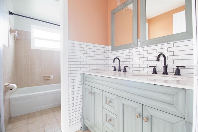 2620 Baltic Pl, Holiday, FL 34691 - bathroom with double vanity, tile patterned flooring, tile walls, and a sink