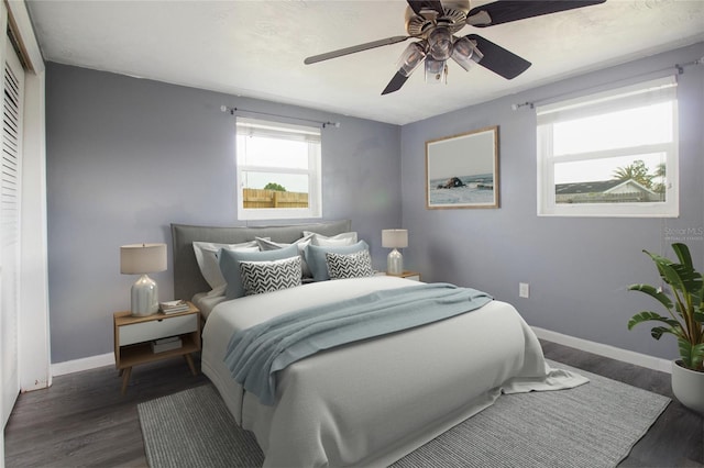 2620 Baltic Pl, Holiday, FL 34691 - bedroom featuring ceiling fan, baseboards, and wood finished floors
