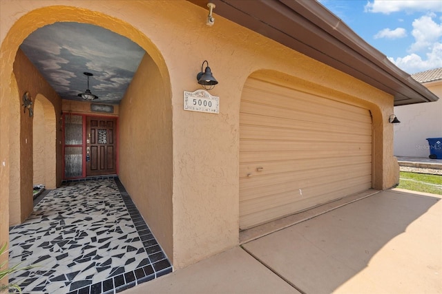 5000 Southshore Dr, New Port Richey, FL 34652 - garage with concrete driveway and covered porch