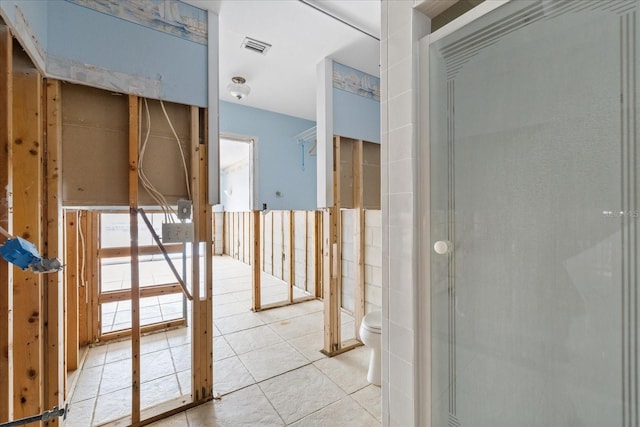 5000 Southshore Dr, New Port Richey, FL 34652 - full bath featuring a stall shower and tile patterned floors