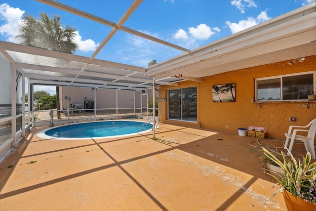 5000 Southshore Dr, New Port Richey, FL 34652 - outdoor pool featuring a patio area and a lanai