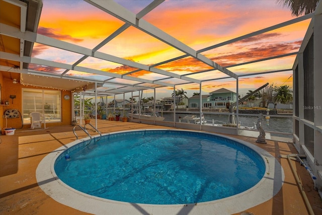 5000 Southshore Dr, New Port Richey, FL 34652 - outdoor pool featuring a patio and a lanai