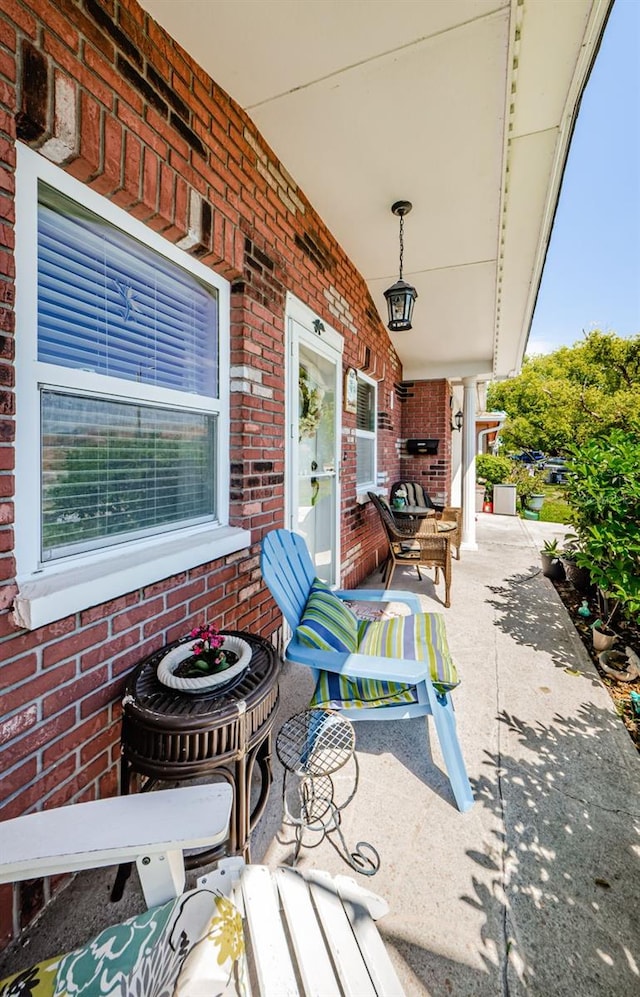 4107 Glissade Dr, New Port Richey, FL 34652 - view of patio / terrace with covered porch