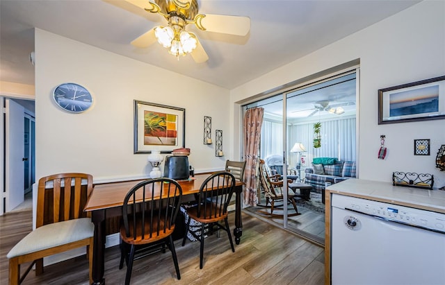 4107 Glissade Dr, New Port Richey, FL 34652 - dining room featuring wood finished floors and a ceiling fan